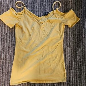 Yellow tank top showing shoulders